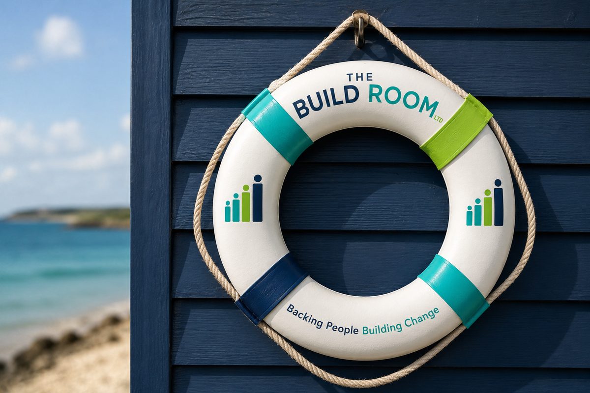 A Build Room branded lifebuoy reading Backing People Building Change
